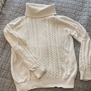 White turtle neck cable knit sweater